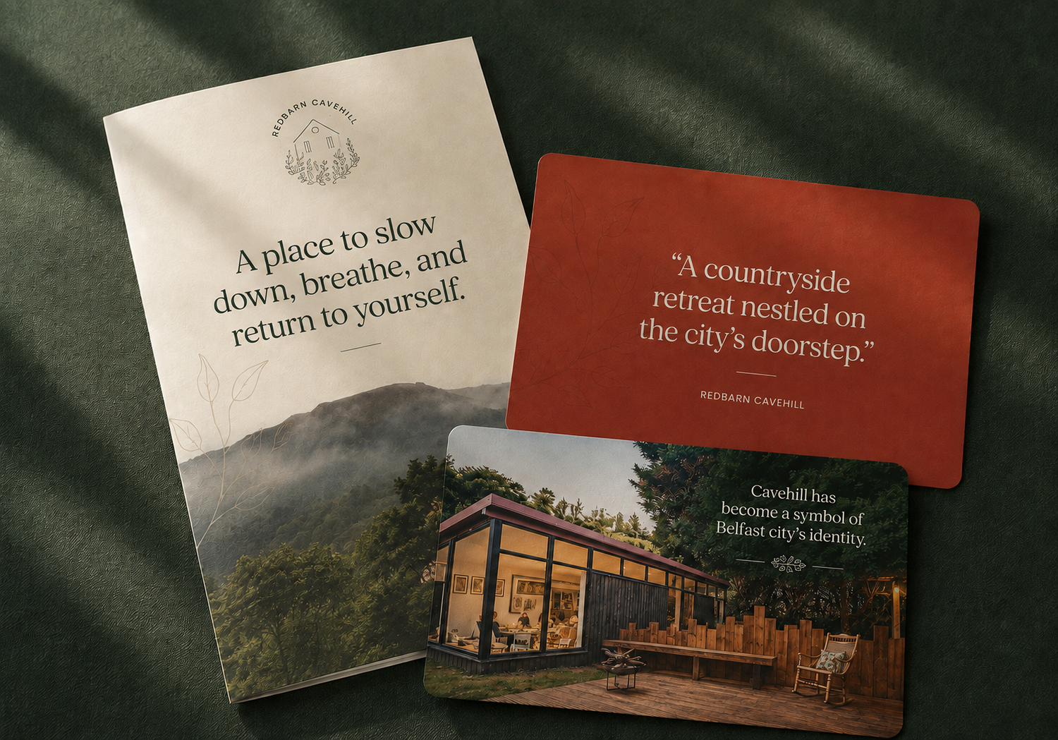 Redbarn Cavehill branded marketing materials featuring a countryside retreat brochure, accommodation photography and promotional cards.